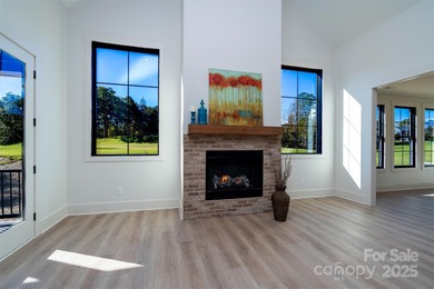 Experience refined living in this stunning new construction on River Oaks Country Club in North Carolina - for sale on GolfHomes.com, golf home, golf lot
