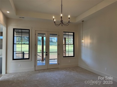 Experience refined living in this stunning new construction on River Oaks Country Club in North Carolina - for sale on GolfHomes.com, golf home, golf lot