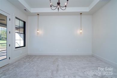 Experience refined living in this stunning new construction on River Oaks Country Club in North Carolina - for sale on GolfHomes.com, golf home, golf lot