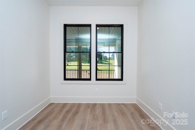 Experience refined living in this stunning new construction on River Oaks Country Club in North Carolina - for sale on GolfHomes.com, golf home, golf lot