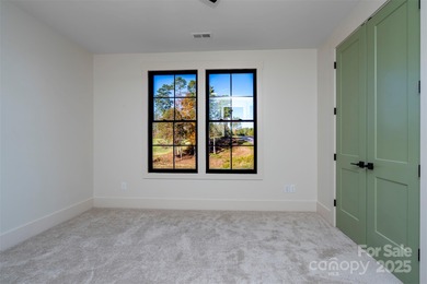 Experience refined living in this stunning new construction on River Oaks Country Club in North Carolina - for sale on GolfHomes.com, golf home, golf lot