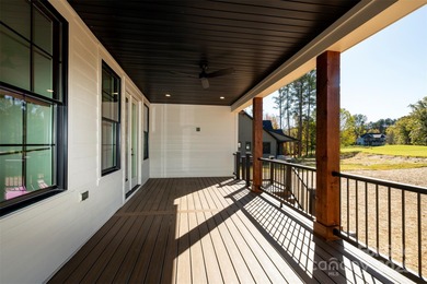 Experience refined living in this stunning new construction on River Oaks Country Club in North Carolina - for sale on GolfHomes.com, golf home, golf lot