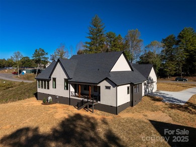 Experience refined living in this stunning new construction on River Oaks Country Club in North Carolina - for sale on GolfHomes.com, golf home, golf lot