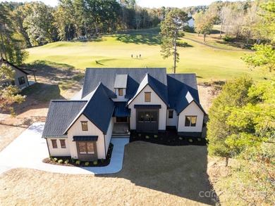 Experience refined living in this stunning new construction on River Oaks Country Club in North Carolina - for sale on GolfHomes.com, golf home, golf lot