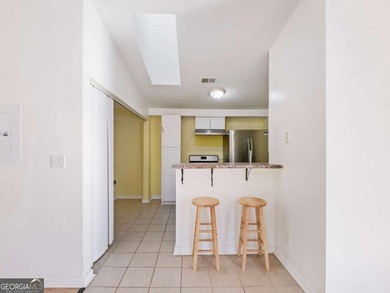 Discover cozy, low-maintenance living in this charming end-unit on Heritage Golf Links in Georgia - for sale on GolfHomes.com, golf home, golf lot