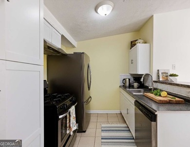 Discover cozy, low-maintenance living in this charming end-unit on Heritage Golf Links in Georgia - for sale on GolfHomes.com, golf home, golf lot