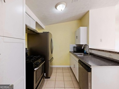 Discover cozy, low-maintenance living in this charming end-unit on Heritage Golf Links in Georgia - for sale on GolfHomes.com, golf home, golf lot