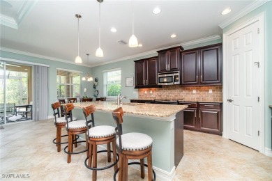 Fall in Love with This Stunning 3-Bedroom + Den Home with Pool on Herons Glen Golf and Country Club in Florida - for sale on GolfHomes.com, golf home, golf lot