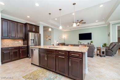 Fall in Love with This Stunning 3-Bedroom + Den Home with Pool on Herons Glen Golf and Country Club in Florida - for sale on GolfHomes.com, golf home, golf lot