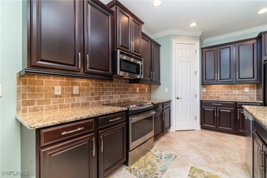 Fall in Love with This Stunning 3-Bedroom + Den Home with Pool on Herons Glen Golf and Country Club in Florida - for sale on GolfHomes.com, golf home, golf lot