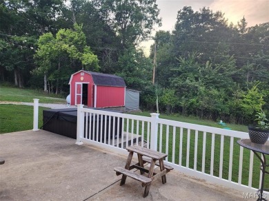 Welcome to this charming 3-bedroom, 3-bath split foyer home on Terre Du Lac Golf and Country Club in Missouri - for sale on GolfHomes.com, golf home, golf lot