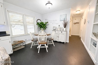 Located in unrestricted Arapahoe, this charming 3-bedroom on Minnesott Golf and Country Club in North Carolina - for sale on GolfHomes.com, golf home, golf lot