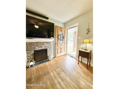 Located in unrestricted Arapahoe, this charming 3-bedroom on Minnesott Golf and Country Club in North Carolina - for sale on GolfHomes.com, golf home, golf lot