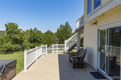 Welcome to this charming 3-bedroom, 3-bath split foyer home on Terre Du Lac Golf and Country Club in Missouri - for sale on GolfHomes.com, golf home, golf lot