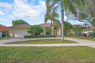 This former model home offers breathtaking lake and golf course on The Wanderers Club in Florida - for sale on GolfHomes.com, golf home, golf lot