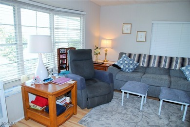 This move-in ready home, located along the tranquil perimeter of on Six Lakes Country Club in Florida - for sale on GolfHomes.com, golf home, golf lot