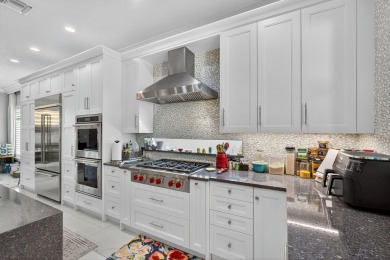 Elegant Golf Course Estate with Immediate Full Golf Membership! on Jupiter Country Club in Florida - for sale on GolfHomes.com, golf home, golf lot