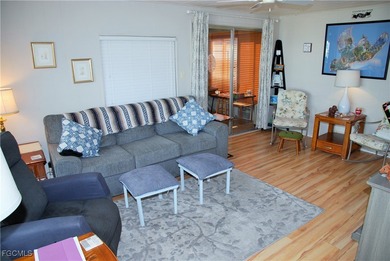 This move-in ready home, located along the tranquil perimeter of on Six Lakes Country Club in Florida - for sale on GolfHomes.com, golf home, golf lot