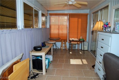 This move-in ready home, located along the tranquil perimeter of on Six Lakes Country Club in Florida - for sale on GolfHomes.com, golf home, golf lot