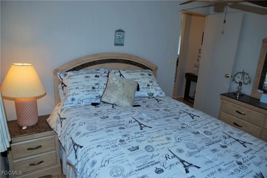 This move-in ready home, located along the tranquil perimeter of on Six Lakes Country Club in Florida - for sale on GolfHomes.com, golf home, golf lot