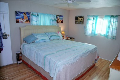 This move-in ready home, located along the tranquil perimeter of on Six Lakes Country Club in Florida - for sale on GolfHomes.com, golf home, golf lot