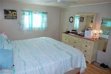 This move-in ready home, located along the tranquil perimeter of on Six Lakes Country Club in Florida - for sale on GolfHomes.com, golf home, golf lot