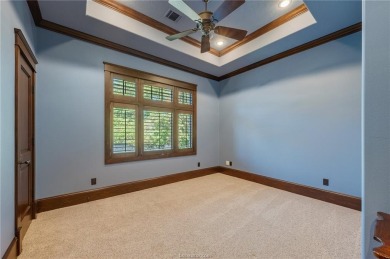 Welcome to this stunning 4-bedroom, 5.5-bathroom retreat nestled on The Traditions Club At Texas A and M in Texas - for sale on GolfHomes.com, golf home, golf lot