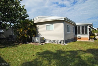 This move-in ready home, located along the tranquil perimeter of on Six Lakes Country Club in Florida - for sale on GolfHomes.com, golf home, golf lot