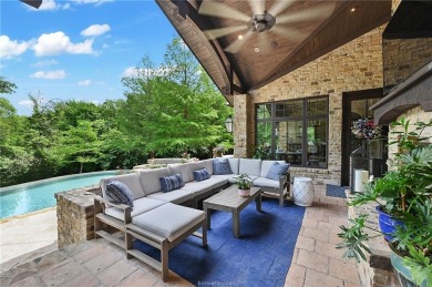 Welcome to this stunning 4-bedroom, 5.5-bathroom retreat nestled on The Traditions Club At Texas A and M in Texas - for sale on GolfHomes.com, golf home, golf lot