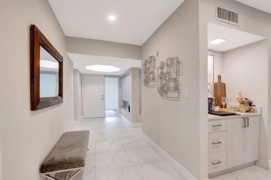Enjoy the Florida lifestyle in this gorgeous 3rd-floor condo in on Boca Grove Golf and Tennis in Florida - for sale on GolfHomes.com, golf home, golf lot
