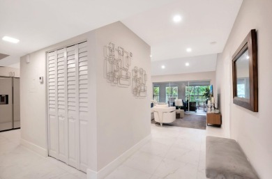 Enjoy the Florida lifestyle in this gorgeous 3rd-floor condo in on Boca Grove Golf and Tennis in Florida - for sale on GolfHomes.com, golf home, golf lot