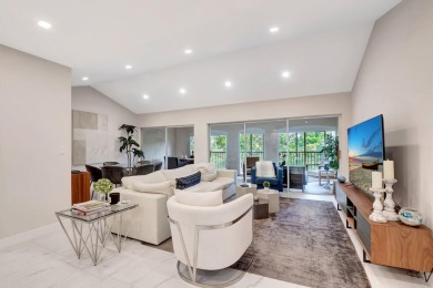 Enjoy the Florida lifestyle in this gorgeous 3rd-floor condo in on Boca Grove Golf and Tennis in Florida - for sale on GolfHomes.com, golf home, golf lot