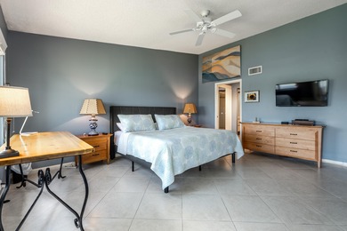 Wake up every day to shimmering waterfront and sweeping golf on Gleneagles Golf and Country Club in Florida - for sale on GolfHomes.com, golf home, golf lot