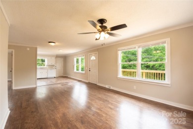 Updated water view home with a full basement, located less than on Piney Point Golf Club in North Carolina - for sale on GolfHomes.com, golf home, golf lot