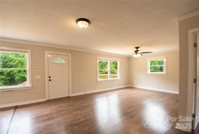 Updated water view home with a full basement, located less than on Piney Point Golf Club in North Carolina - for sale on GolfHomes.com, golf home, golf lot