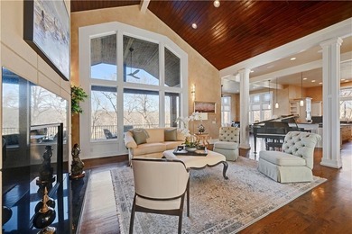 Stunning custom reverse 1.5-story home perfectly positioned on a on Loch Lloyd Country Club in Missouri - for sale on GolfHomes.com, golf home, golf lot