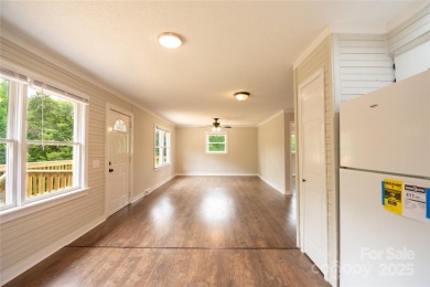 Updated water view home with a full basement, located less than on Piney Point Golf Club in North Carolina - for sale on GolfHomes.com, golf home, golf lot