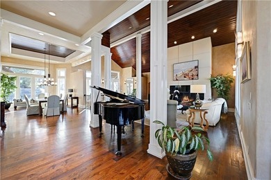 Stunning custom reverse 1.5-story home perfectly positioned on a on Loch Lloyd Country Club in Missouri - for sale on GolfHomes.com, golf home, golf lot