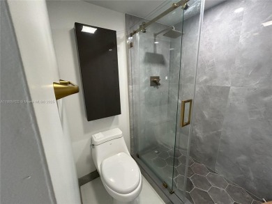 Discover the ultimate in comfort and luxury in this newly on Turnberry Isle Resort and Club in Florida - for sale on GolfHomes.com, golf home, golf lot