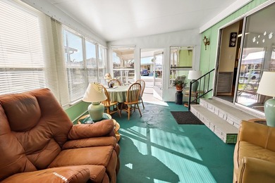 Live the vacation every single day in vibrant Barefoot Bay! This on Barefoot Bay Golf Course in Florida - for sale on GolfHomes.com, golf home, golf lot