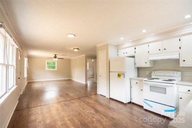 Updated water view home with a full basement, located less than on Piney Point Golf Club in North Carolina - for sale on GolfHomes.com, golf home, golf lot