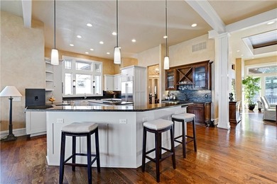 Stunning custom reverse 1.5-story home perfectly positioned on a on Loch Lloyd Country Club in Missouri - for sale on GolfHomes.com, golf home, golf lot