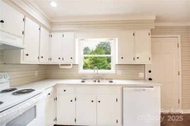 Updated water view home with a full basement, located less than on Piney Point Golf Club in North Carolina - for sale on GolfHomes.com, golf home, golf lot
