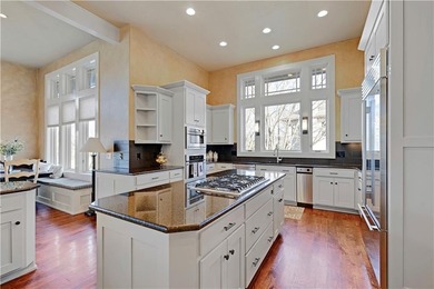 Stunning custom reverse 1.5-story home perfectly positioned on a on Loch Lloyd Country Club in Missouri - for sale on GolfHomes.com, golf home, golf lot