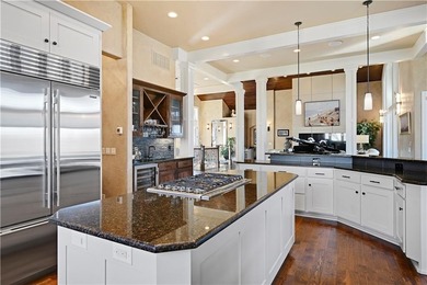 Stunning custom reverse 1.5-story home perfectly positioned on a on Loch Lloyd Country Club in Missouri - for sale on GolfHomes.com, golf home, golf lot