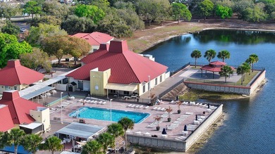 Live the vacation every single day in vibrant Barefoot Bay! This on Barefoot Bay Golf Course in Florida - for sale on GolfHomes.com, golf home, golf lot