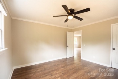 Updated water view home with a full basement, located less than on Piney Point Golf Club in North Carolina - for sale on GolfHomes.com, golf home, golf lot