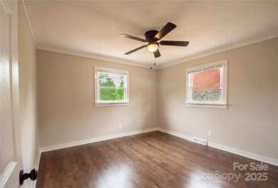 Updated water view home with a full basement, located less than on Piney Point Golf Club in North Carolina - for sale on GolfHomes.com, golf home, golf lot