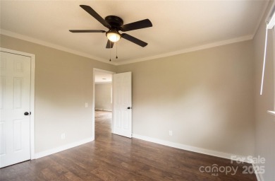 Updated water view home with a full basement, located less than on Piney Point Golf Club in North Carolina - for sale on GolfHomes.com, golf home, golf lot