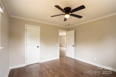 Updated water view home with a full basement, located less than on Piney Point Golf Club in North Carolina - for sale on GolfHomes.com, golf home, golf lot